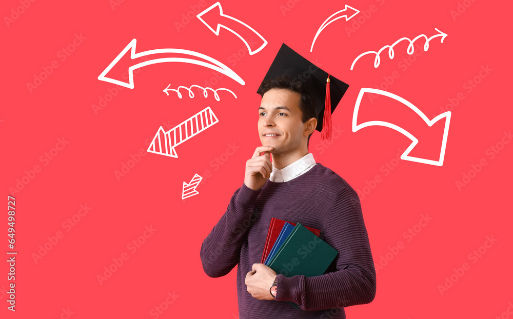 Thoughtful male graduating student and many arrows on red background. Concept of choice