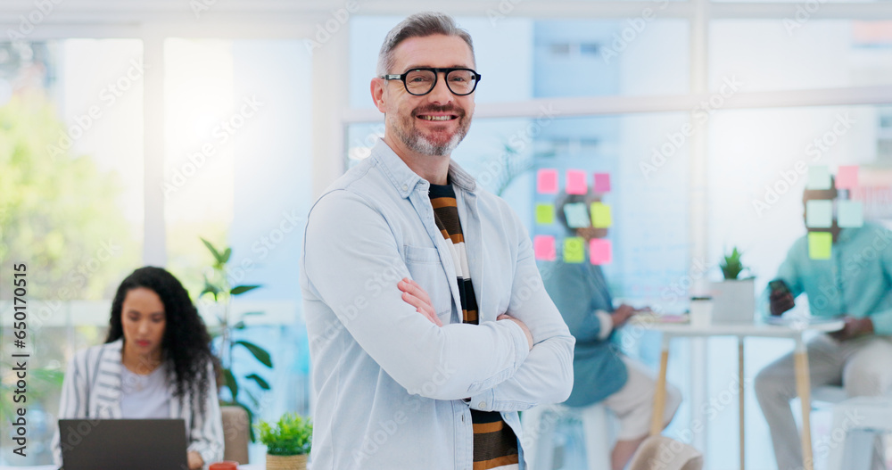 Happy, business pride and a man with arms crossed at a creative agency for consulting and design. Smile, confident and face portrait of a mature leadership management with technology for creative con