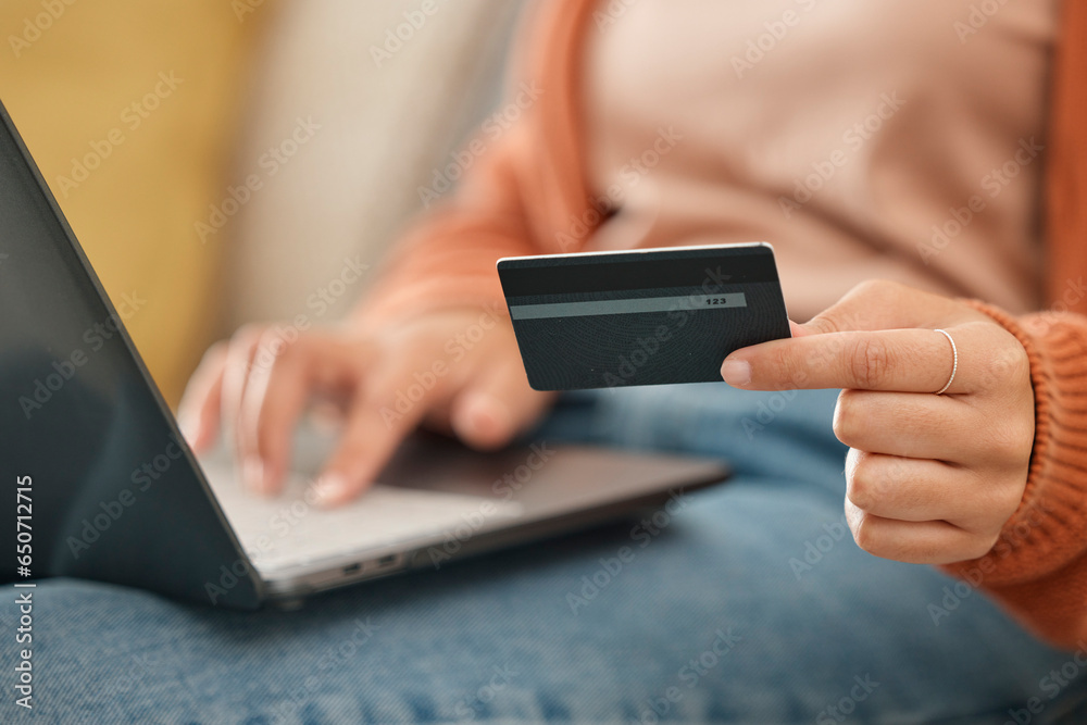 Closeup, woman and laptop with credit card, online shopping and transaction in a lounge. Person, home and girl on a sofa, pc or digital app with payment, banking and budget with fintech or investment