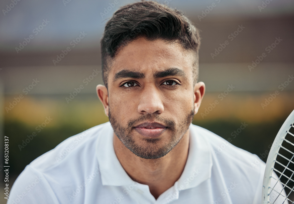 Serious, portrait and a man for a tennis game, fitness and getting ready for a match. Motivation, young and an athlete or sports player with a racket for cardio, workout or training with exercise
