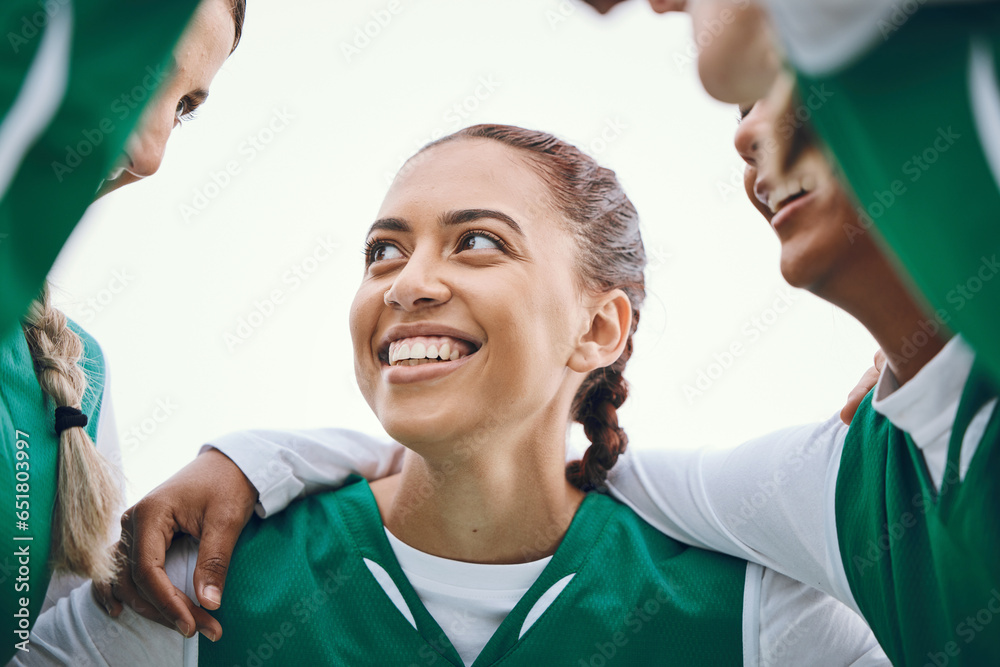 Happy, woman and team huddle in sport, game or conversation on field for advice match in soccer competition. Football player, group or support in exercise, workout or training collaboration together