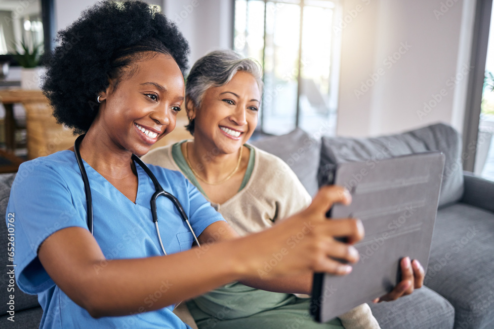 Selfie, tablet and assisted living caregiver with an old woman in the living room of a home together. Smile, support or community with a happy nurse or volunteer and senior patient in a house