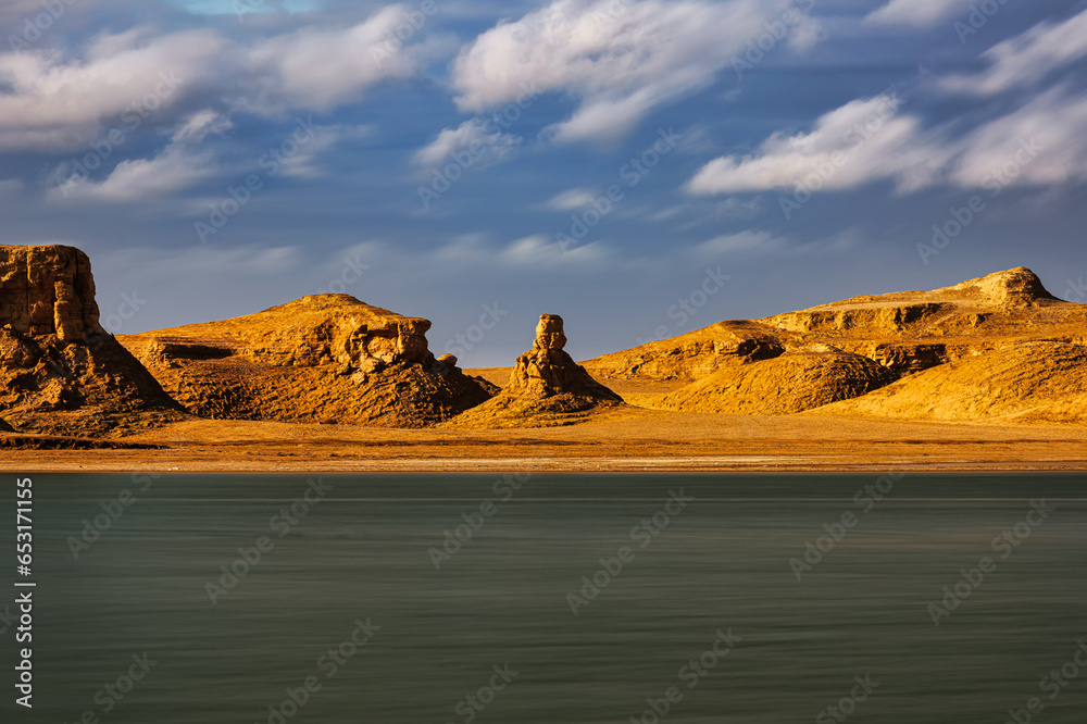 Yardang landforms in the water in sunset