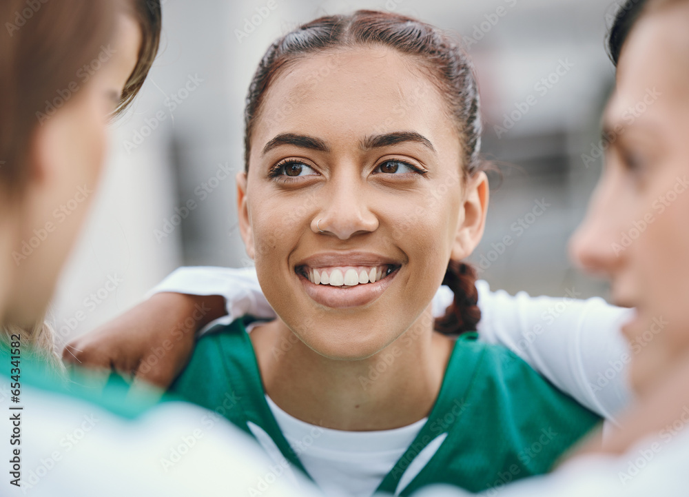 Happy, woman and team huddle in sports, game or conversation on field for advice in soccer match or competition. Football player, group and support in circle or exercise, workout or training together