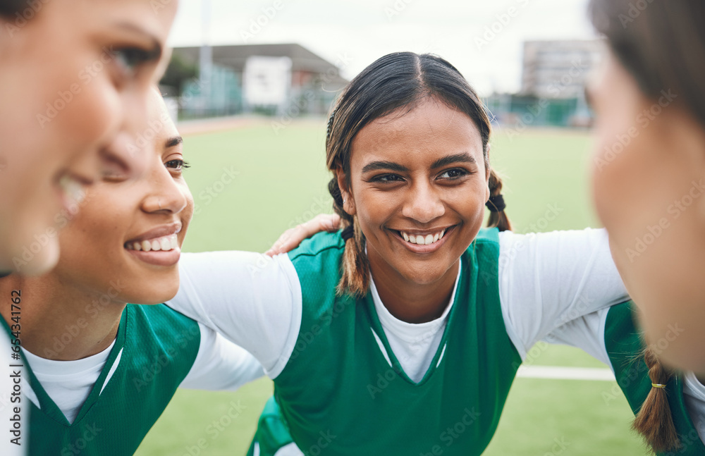 Happy, woman and team huddle in sports, game or conversation on field for advice match in soccer competition. Football player, group and support in exercise, workout or training together on grass