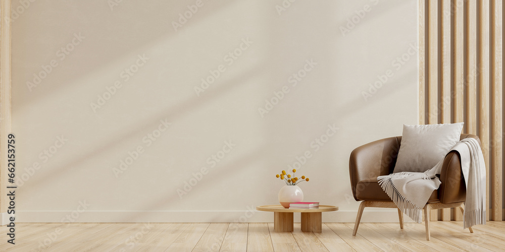 Modern minimal interior with an leather armchair on empty cream color wall background