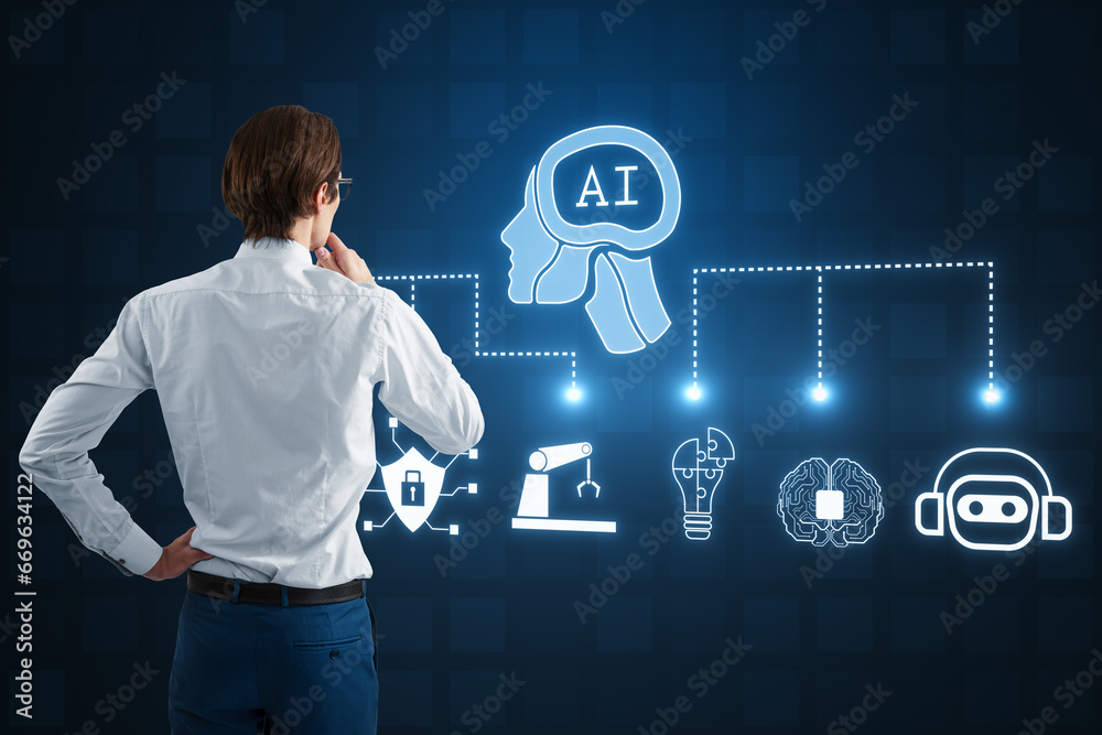 Back view of thoughtful businessman looking at glowing ai hologram with digital human head on blue background. Automated machine learning, artificial intelligence and conversation assistant concept.