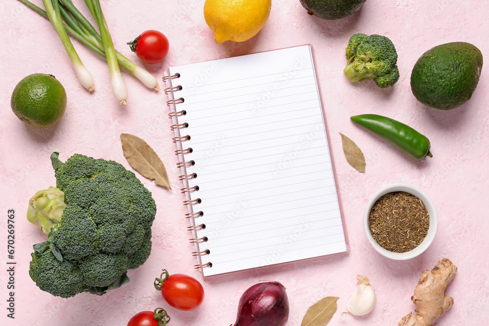 Composition with blank recipe book, vegetables and spices on color background