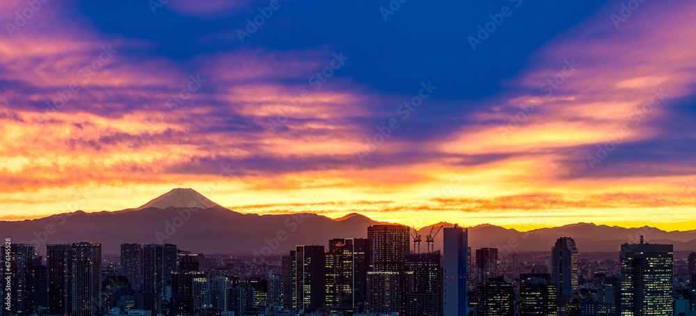View of Mount Fuji from Tokyo, Japan at sunset with rare Mountain Shadow
