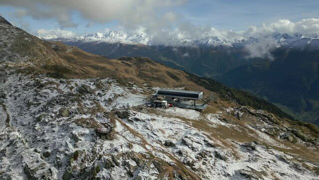 Mountain station of a gondola lift on the Riederalp in Switzerland. The first snow has fallen and winter begins