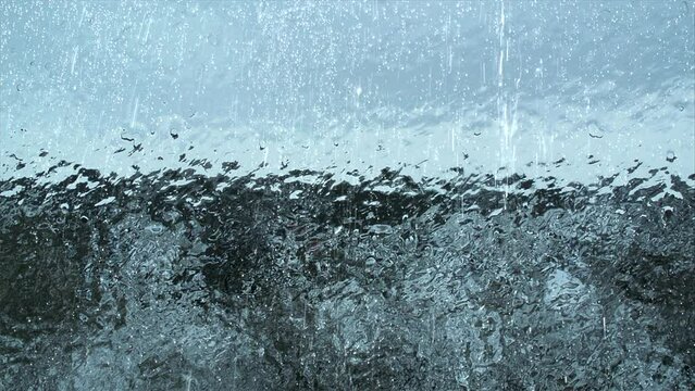 Freezing rain. Glass of window. Late autumn. Beginning of winter