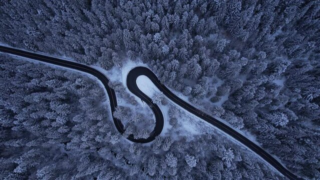 Top view of spectacular mountain road in winter.Serpentines from Romania mountains,Cheile Bicazului.