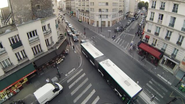 View from the top to the crossroad with traffic and pedestrians