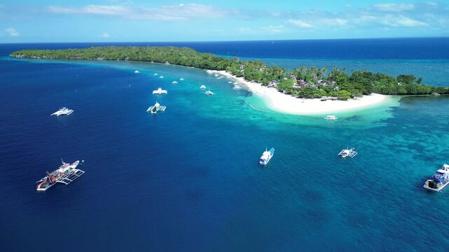 Aerial view of boats moored off the shore of Camotes Islands in the Camotes Sea in Cebu, Philippines