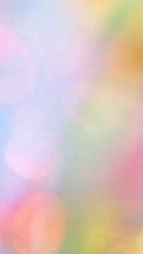 色彩柔和的抽象背景，伴有柔和模糊的光线和彩虹渐变。