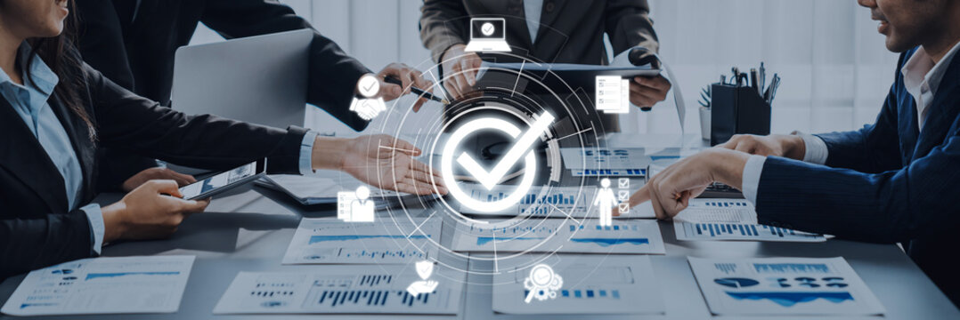 A dynamic business meeting showing a team collaborating on data analysis, engaging with reports and digital icons symbolizing technology and success. Trope