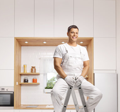 Worker sitting on a ladder