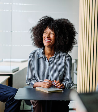 Group of young businesspeople having a meeting or presentation and seminar standing in the office. Portrait of a young businesswoman talking